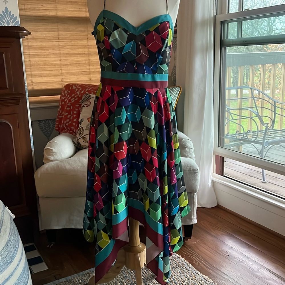 Beautiful Milly, handkerchief hem dress.